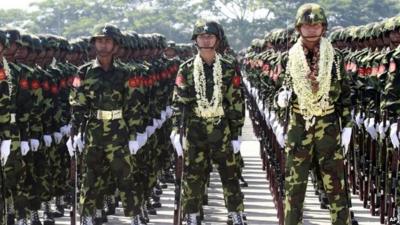 Myanmar soldiers attend a ceremony marking the country's 67th Armed Forces Day