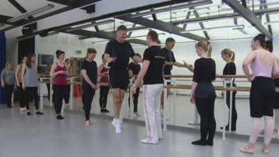 John Beattie at the barre