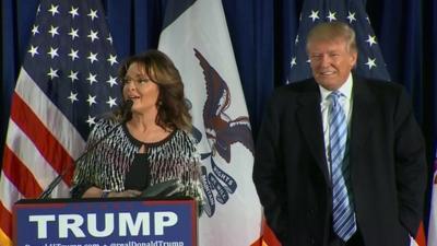 Sarah Palin standing next to Donald Trump