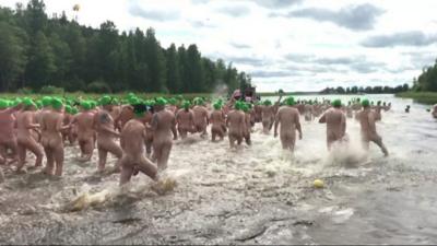 People run into water in Finland