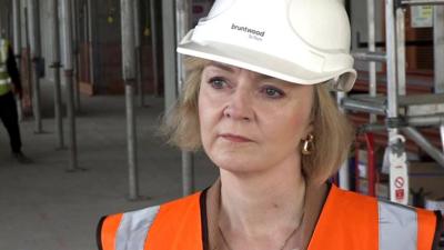 Liz Truss wearing a hard hat