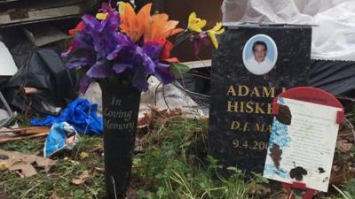 Memorials to Adam Hiskey on the A414