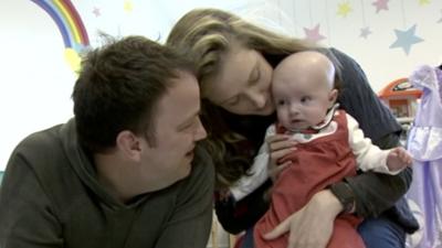 James Phillips and Sarah Penn with daughter Adelina