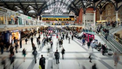 Commuters at London Liverpool Street Station