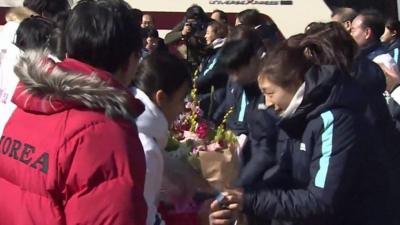 The North Korean women's ice hockey team has arrived in South Korea to form a joint Olympic team.