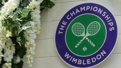 wimbledon logo surrounded by flowers