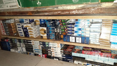 Cigarettes on a shelf hidden below ground