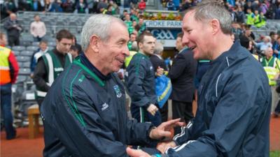 Fermanagh manager Peter McGrath shakes hands with Dublin manager Jim Gavin