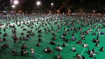 Crowds attend a Tiananmen Square vigil at Hong Kong's Victoria Park