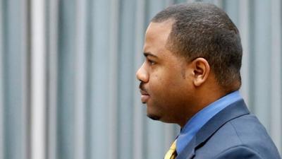 William Porter, one of six Baltimore city police officers charged in connection to the death of Freddie Gray, walks to a courthouse for jury selection in his trial, Monday, Nov. 30, 2015, in Baltimore. Porter faces charges of manslaughter, assault, reckless endangerment and misconduct in office.