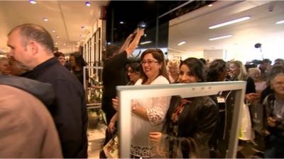 Shoppers entering the newly opened John Lewis at Birmingham's Grand Central