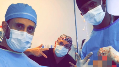 Plastic surgeons in theatre