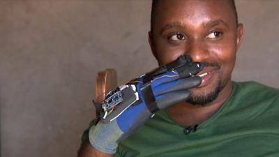 Lucky Mashudu with his sign language glove