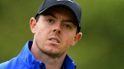 Rory McIlroy was content with his second round in difficult conditions