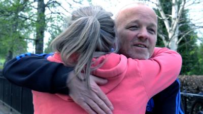 Jim and Margaret hug