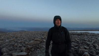 BBC Scotland correspondent James Shaw climbing Ben Nevis