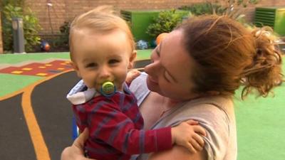 Archie with mum Kate Perkins