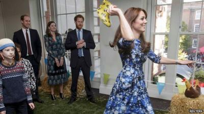 Kate, Duchess of Cambridge takes part in welly wanging