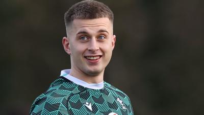 Cameron Winnett looks relaxed in Wales training