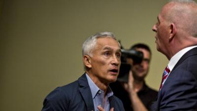 Jorge Ramos escorted from the room