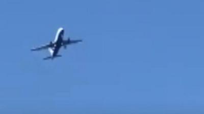 A plane travelling from London to Gibraltar was forced to land in Malaga due to strong winds,