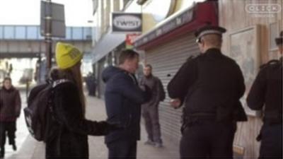 Police and passersby in east London