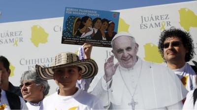 Activists demonstrate in support of migrants before Pope Francis" visit to Ciudad Juarez, February 16, 2016.