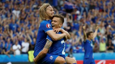 Iceland's footballers celebrate a goal