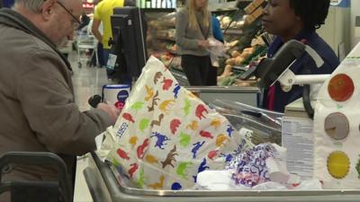 Tesco checkout worker