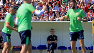 Local children watch on during Republic of Ireland training