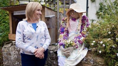 Droxford resident and her scarecrow