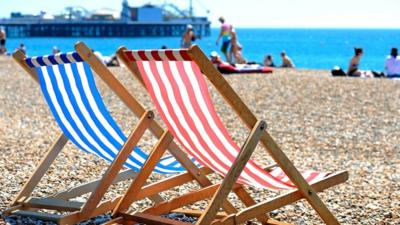 Deck chairs on the beach in Brighton