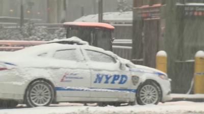 NYPD car in snow