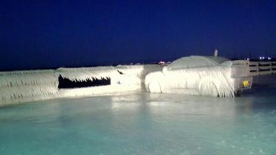 Car covered in snow in New York in America.