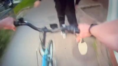 Bodycam footage shows an officer pursuing a drugs suspect who had dumped his bike and run away.