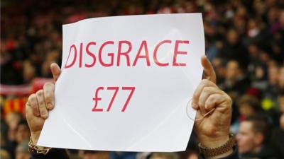 Liverpool fan holds a sign in 2-2 draw against Sunderland Anfield