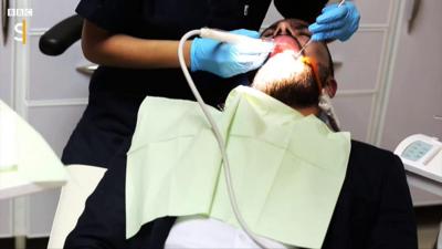 Man in dentist's chair