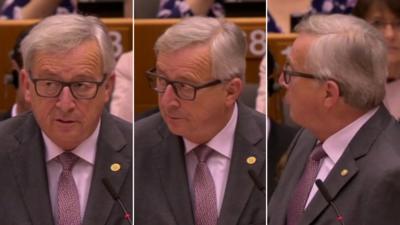 European Commission President Jean-Claude Juncker reacts during a speech in the European Parliament