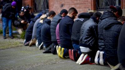 Salafist supporters praying in Germany - file pic