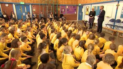 Children at school assembly