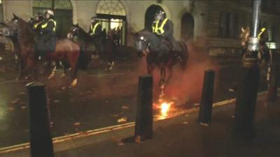 Fireworks were thrown at mounted police during the Millions Masks March