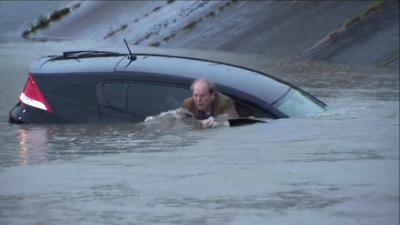 Houston TV reporter rescues driver