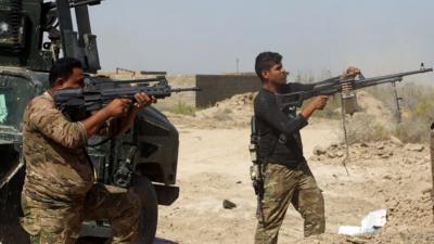 Member of Iraqi government forces in Fallujah's southern Shuhada neighbourhood on 15 June 2016.