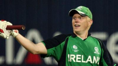 Kevin O'Brien acknowledges the applause after reaching the 100-mark during his record-breaking innings in Bangalore