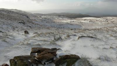 As high ground across Wales, Scotland and northern England sees their first dusting of snow of the season, will places lower down get a glimpse of the white stuff?