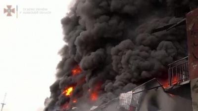 Flames and smoke at a building in Lviv