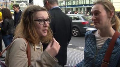 French travellers at St Pancras talking about the suspension of train services