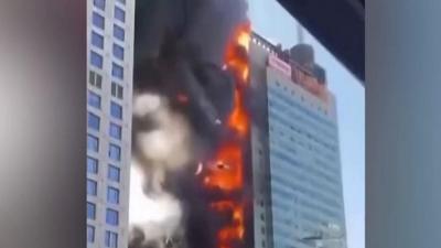 Fire rages in office building in China