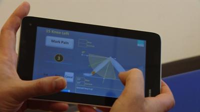 Knee movement shown on handheld device