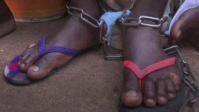 Feet in shackles